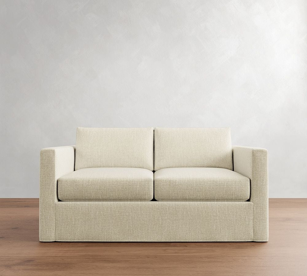 Sofa with slender armrests