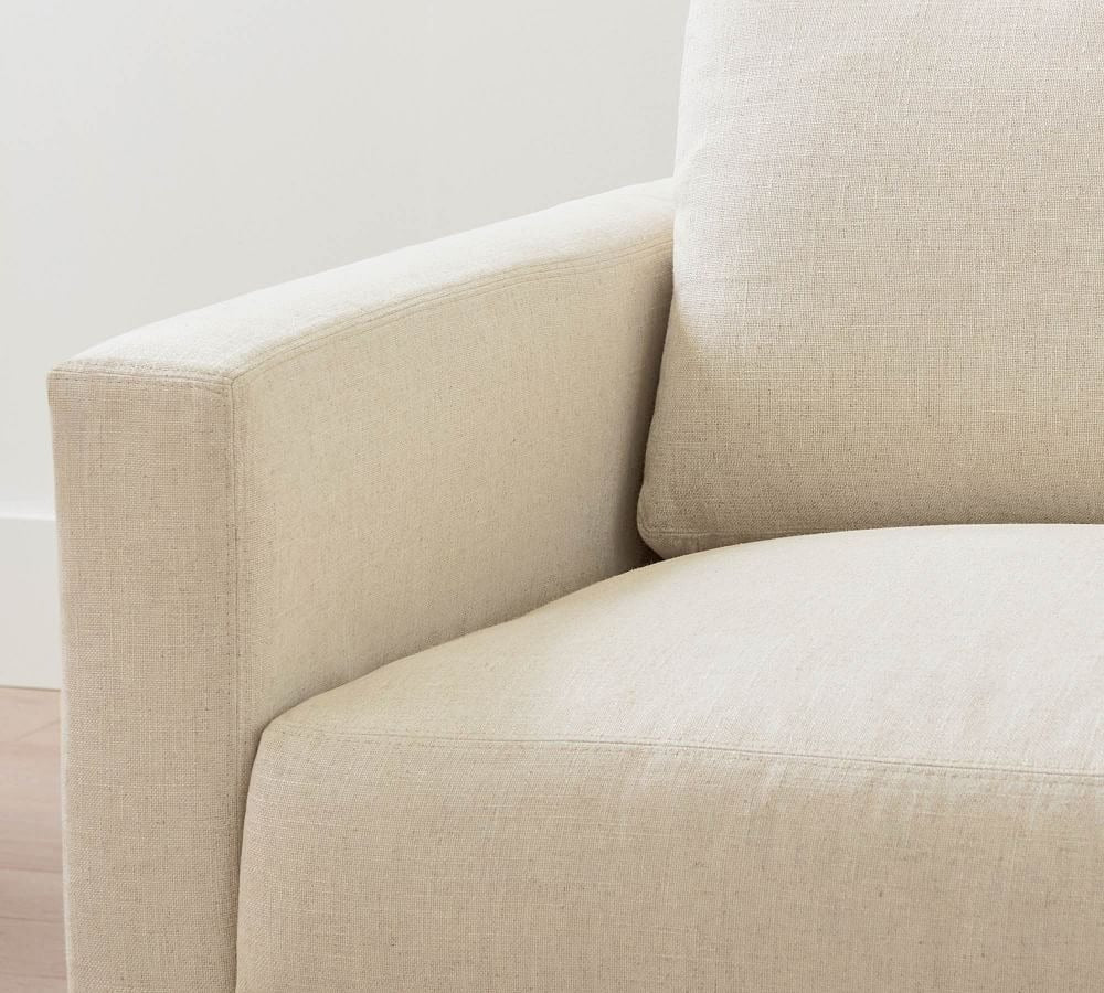 Sofa with slender armrests